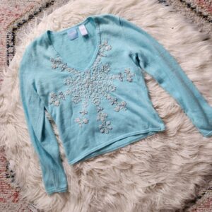 Snowflake Spectacle Sweater