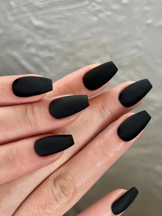 How can you apply black nail polish