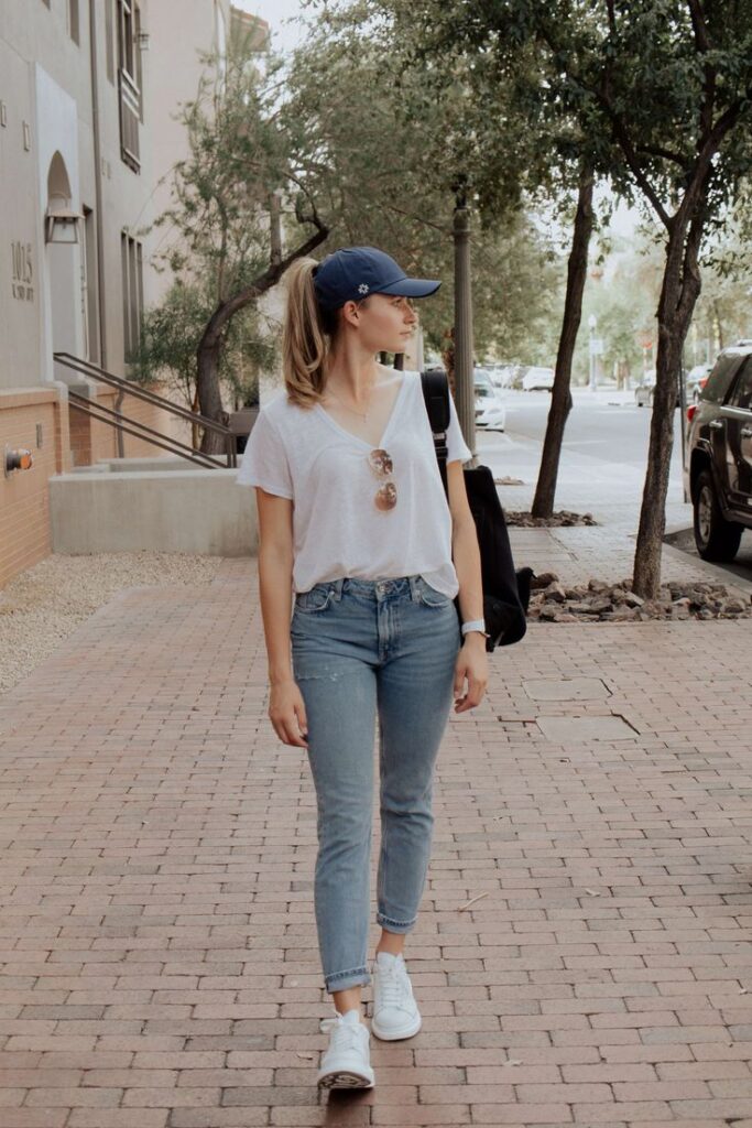 T-Shirt, Jeans, Coat, and a Baseball Cap