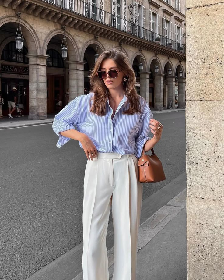 Cornflower Blue button-down shirt with beige trousers